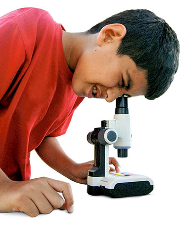 Child and microscope
